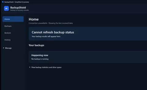 BackupShield development Home screen with navigation for Backups, Restore and History, showing an unavailable service connection and no running backup.